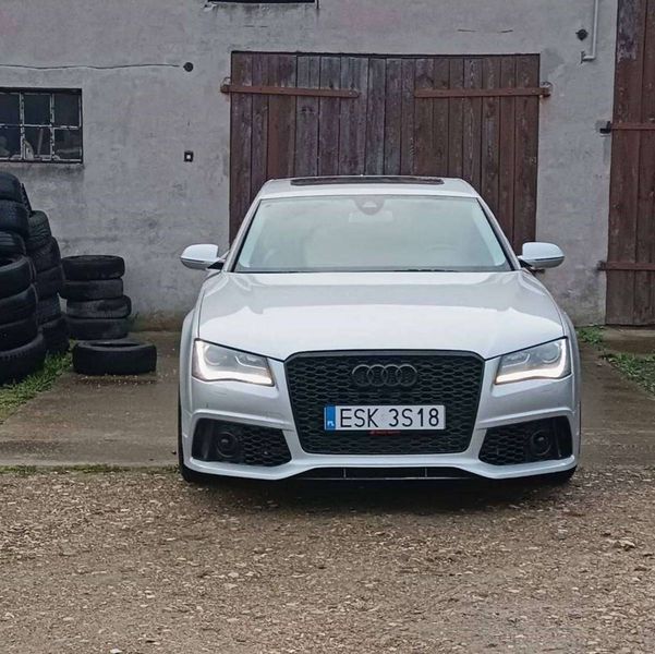Передній бампер на Audi A8 2010-2014 стиль RS V1 429815 фото