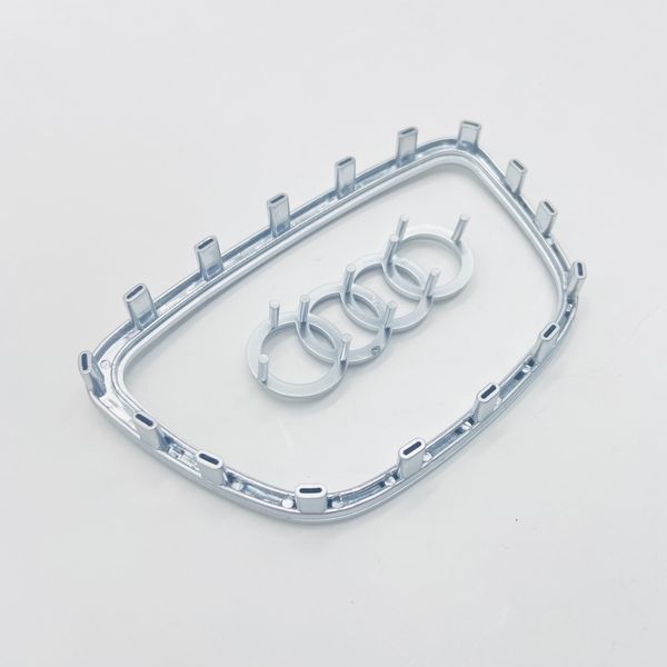 Значок рамка эмблема на руль Audi 2012- 16 клипс серая 424924 фото