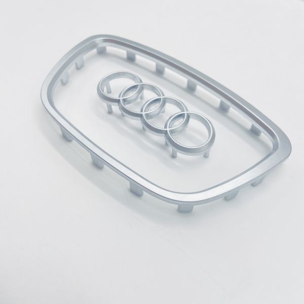 Значок рамка эмблема на руль Audi 2012- 16 клипс серая 424924 фото