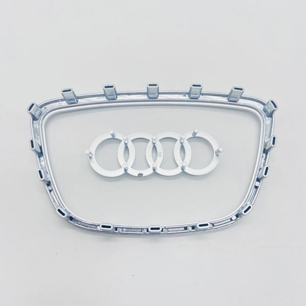 Значок рамка эмблема на руль Audi 2012- 16 клипс серая 424924 фото
