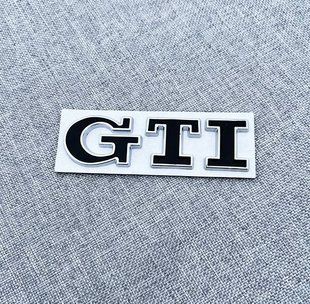 Автологотип емблема напис Volkswagen GTI на кришку багажника чорний хром 237956 фото