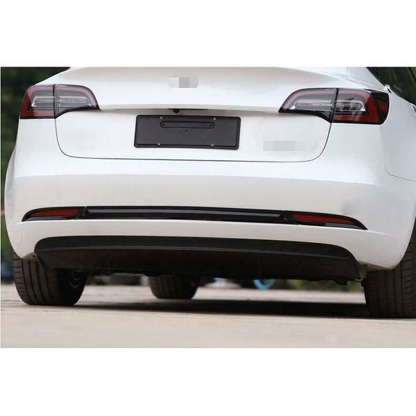 Накладки заднего бампера на Tesla Model 3 2017-2022 черный глянец 416041 фото