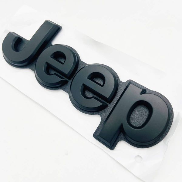 Емблема на кришку багажника Jeep Grand Cherokee 2013-2021 чорний матовий 185x62мм 5UY60DX8AA 418117 фото