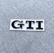 Автологотип емблема напис Volkswagen GTI на кришку багажника чорний хром 237956 фото 1