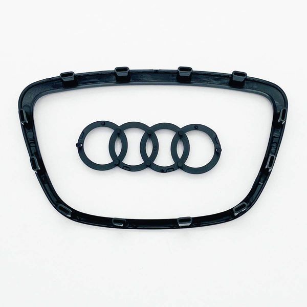 Эмблема логотип шильдик на руль Audi 2012- 12 клипс черный глянец 423919 фото