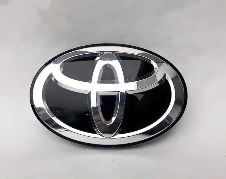 Автологотип эмблема в радиаторной решетке Toyota 92806-176 под стеклом 170x120мм 522623 фото