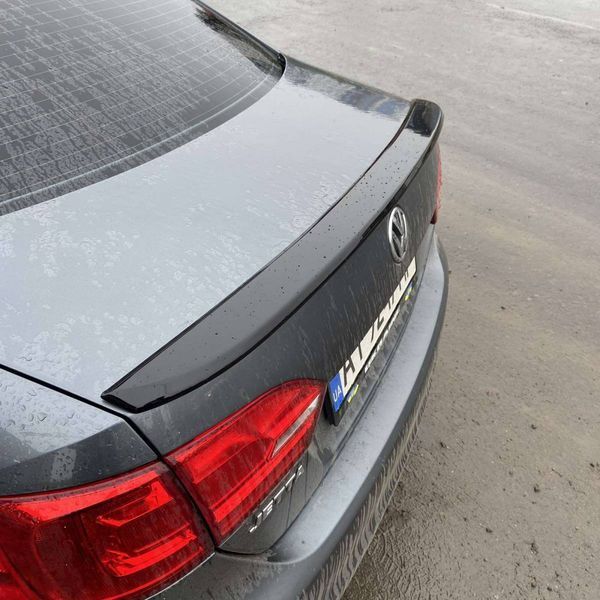 Спойлер на Volkswagen Jetta 2010-2017 чорний глянець 414667 фото Спойлер на Volkswagen Jetta 2010-2017 чорний глянець 414667 фото