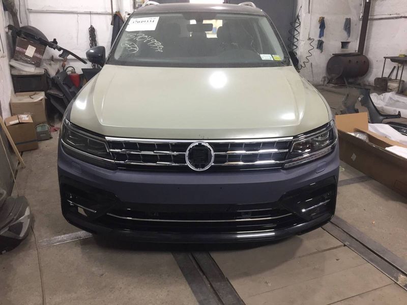 Передний бампер на Volkswagen Tiguan 2015-2019 в стиле R-Line 428726 фото