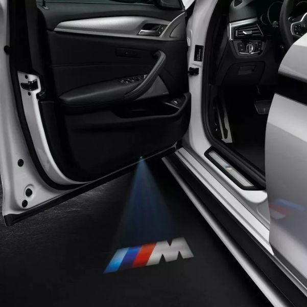Проектор дверей BMW LED оригінал 63312468386 68мм 415575 фото