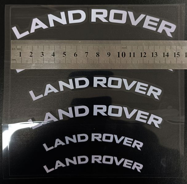 Наклейки на супорт Land Rover білі вигнуті 521631 фото