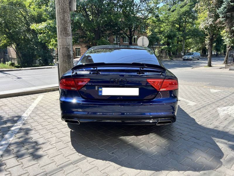 Спойлер на Audi A7 2010-2014 чорний глянець 431460 фото