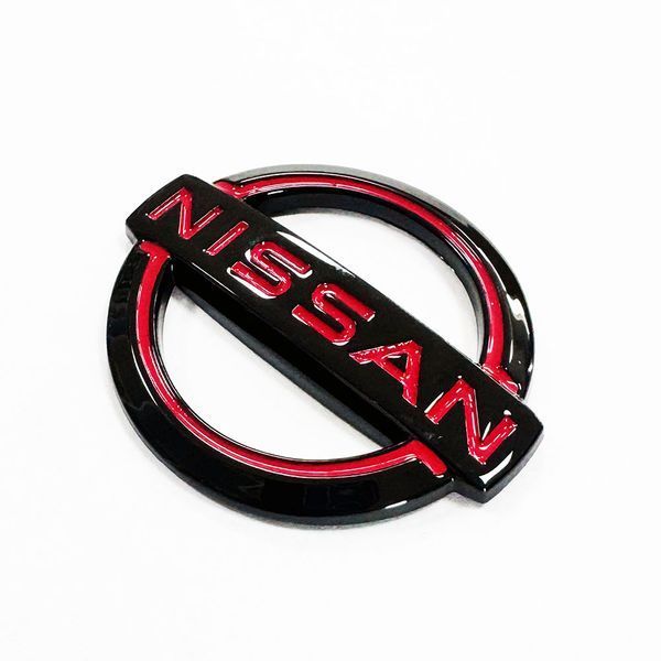 Автологотип шильдик эмблема надпись Nissan 56x48мм Red черный глянец 523596 фото
