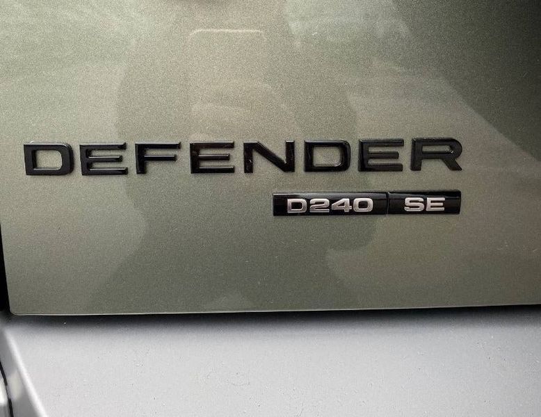 Автологотип емблема напис Land Rover Defender на багажник чорний глянець 425114 фото
