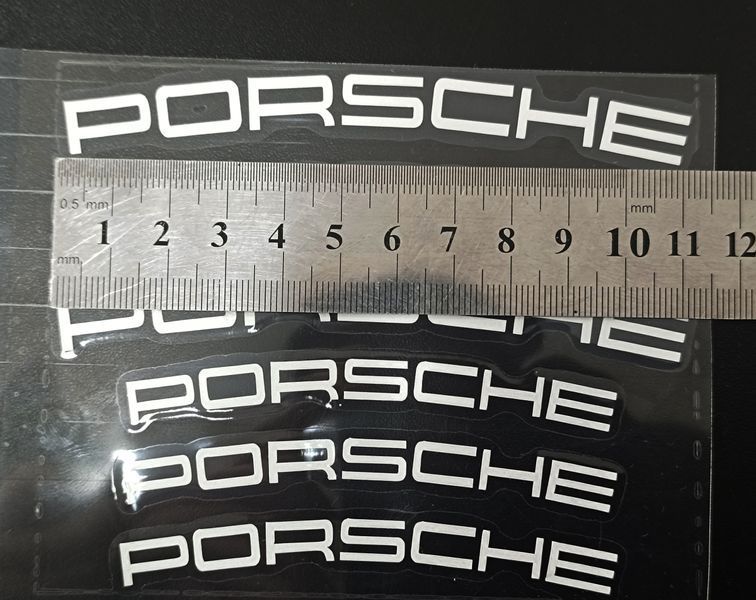 Наклейки на супорт PORSCHE білі вигнуті 431057 фото