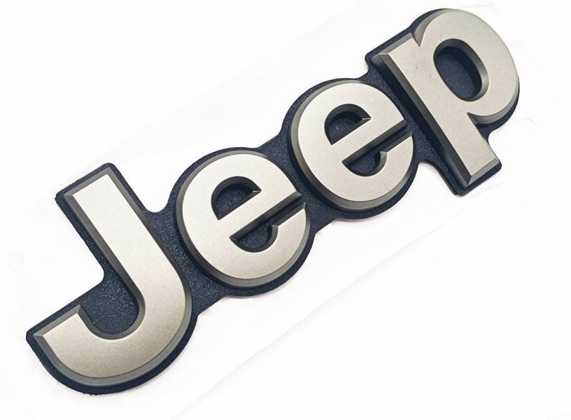 Емблема на кришку багажника Jeep Grand Cherokee 2013-2021 Графіт 185x62мм 5UY60DX8AA 521412 фото