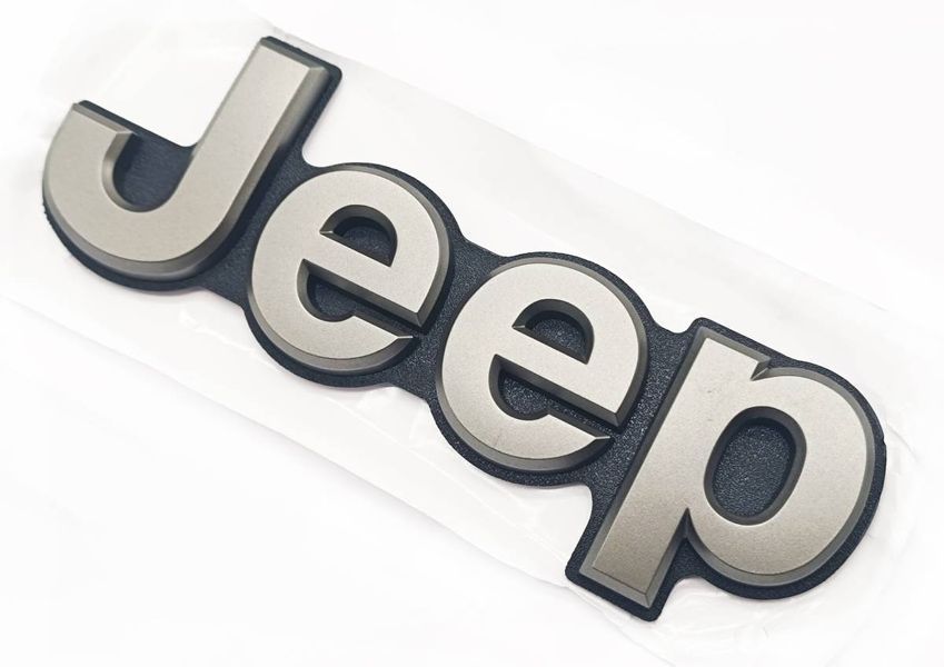 Емблема на кришку багажника Jeep Grand Cherokee 2013-2021 Графіт 185x62мм 5UY60DX8AA 521412 фото