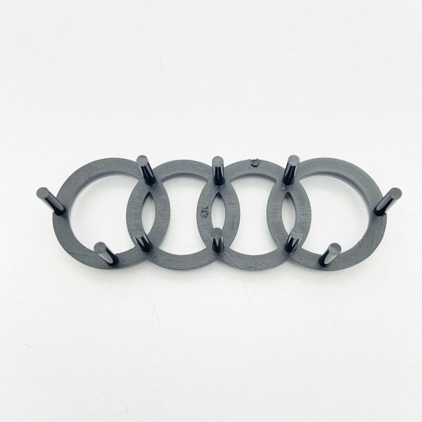 Емблема логотип шильдик на кермо Audi 2012-16 кліпс чорний глянець 423920 фото