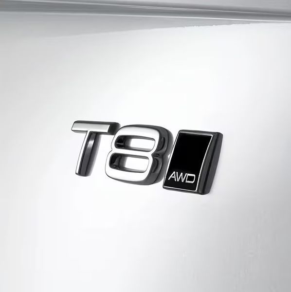 Автологотип емблема Volvo AWD хром рамка 418449 фото Автологотип емблема Volvo AWD хром рамка 418449 фото