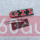 Автологотип шильдик эмблема надпись VW Volkswagen GTI в радиаторную решетку красный хром 5G0853679AF/AG