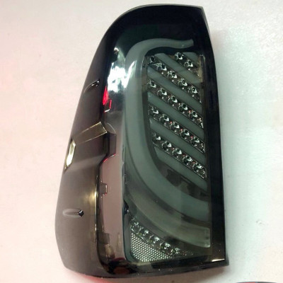 Альтернативная оптика задняя на Toyota Hilux 2014- LED черная Revo JunYan WY-T-13
