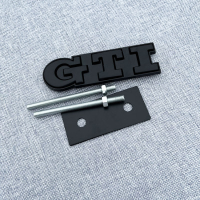 Автологотип шильдик эмблема надпись Volkswagen GTI в решетку радиатора черный